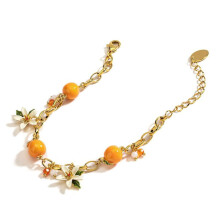 Oranje armband voor dames, stijlvol en modern design.