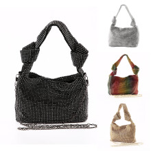 Dámska mini kabelka crossbody s kamienkami a retiazkou