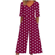 Dame jumpsuit med polkaprikker og V-hals i stretchstof som sommer