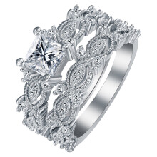 Conjunto de anillos de boda chapados en oro con circonitas que no se empañan para mujer.
