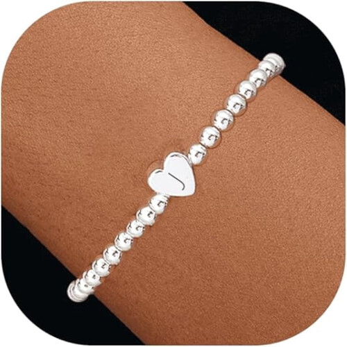 Zartes Damenarmband mit Herzanhänger und elastischen Perlen,