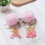 Roze pompon sleutelhanger met hars letter A 6