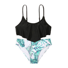 Girls' two-piece leaf-print swimsuit for ages 7–14