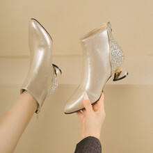 Dames winter enkellaarsjes met metallic zijrits en dikke zool