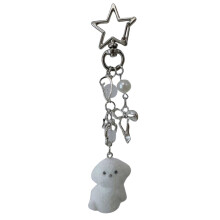 Chaveiro de pelúcia em formato de cachorro para bolsa ou mochila.