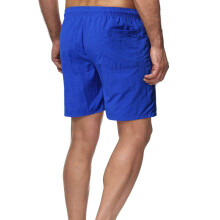 Pantalones cortos de hombre, color azul liso, cintura elástica, tiro medio, corte holgado.