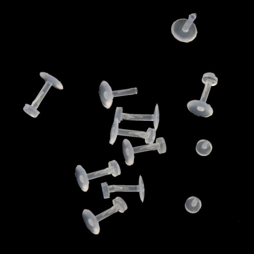 Set van 10 transparante, flexibele piercingsieraden. 1