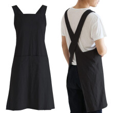 Grembiule da cucina in lino con spalline incrociate e tasche.