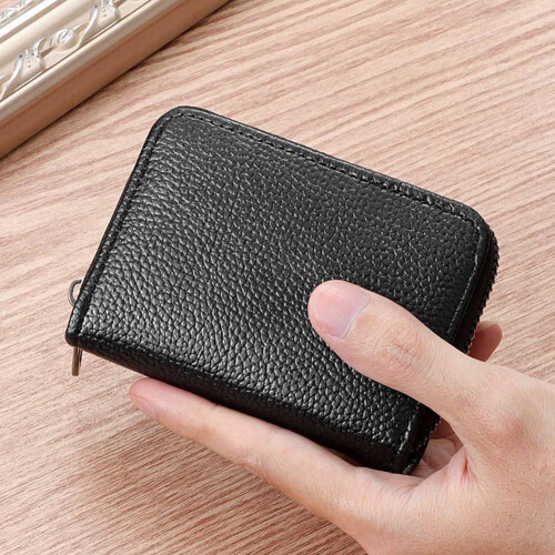 Portafoglio da donna con 20 scomparti per carte e chiusura a zip. 1
