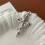 Collana con ciondolo a croce e serpente in argento sterling 925 1