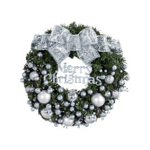 Christmas wreath with silver bow for front door