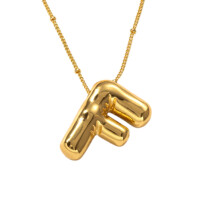 Colar com pingente de letra em formato de bolha em aço inoxidável e titânio banhado a ouro 18K