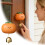 Persimmonformet messing dørklokke med smildesign 1