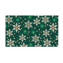Rotolo di carta da regalo natalizia con motivo a fiocchi di neve verdi e Babbo Natale