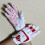 Kinder golfhandschoenen van leer, rood-wit, maat M2. 6