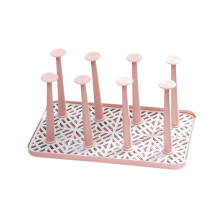 Roze, klein, droogrekje voor melkflessen en glazen
