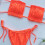 Orangefarbenes, gerafftes Bikini-Set mit Push-up-Polsterung 7
