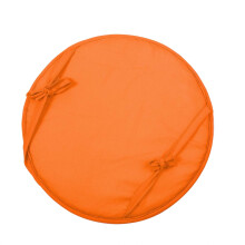 Coussin rond pour chaise d'extérieur, idéal pour les repas en terrasse.