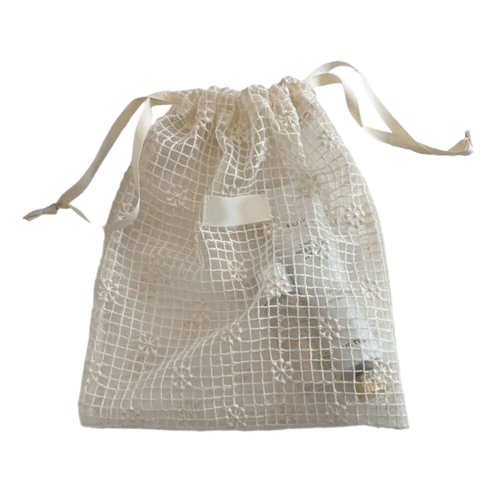 Lace-trimmed mesh drawstring pouch for makeup and jewelry