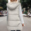 Doudoune longue sans manches blanche réversible pour femme1 5