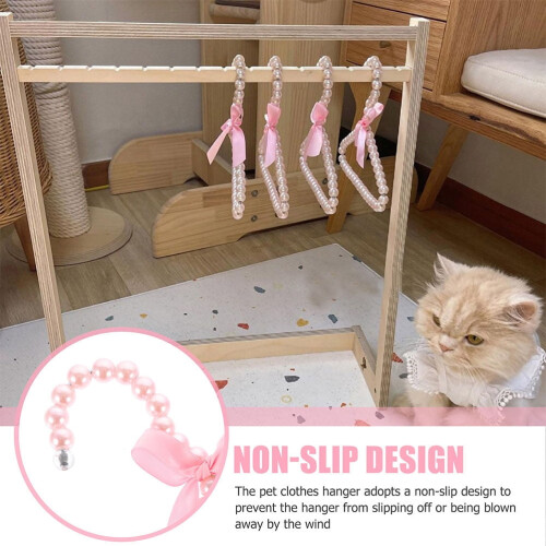 Perchas de plástico rosa para ropa de mascotas (5 unidades) 1