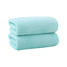Ensemble de 2 serviettes de bain en velours filé, douces et absorbantes.