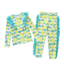 Girls long sleeve swimsuit green flounce hem 9-10 years