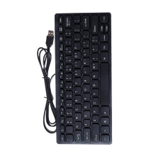 Bedraad USB-minitoetsenbord met 78 toetsen, dun en ergonomisch ontwerp.