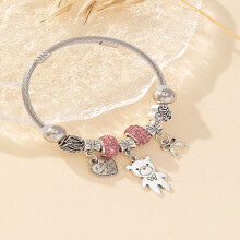 Kralenarmband van roestvrij staal, messing en strass-steentjes.