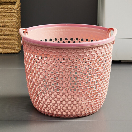 Roze plastic wasmand, draagbare kledingmand