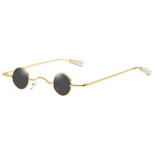 Eleganti occhiali da sole rotondi, unisex, stile retrò.