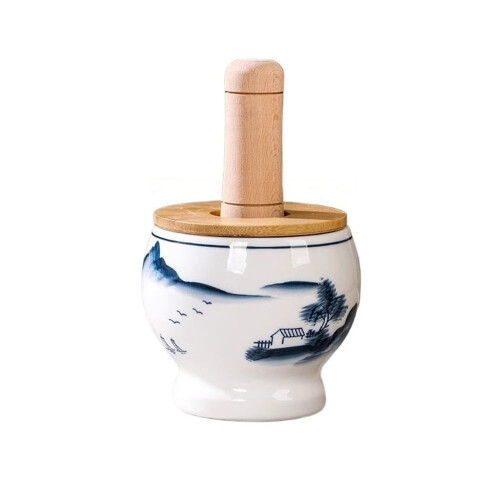 Ceramic garlic pounder with chili pepper design, manual