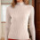 Women's Beige High-Neck Knitted Sweater1 4