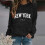Damesvest met letterprint A-Zwart S 2