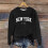 Damesvest met letterprint A-Zwart S 4