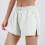 Høylivede sportsshorts med lommer til dame 8