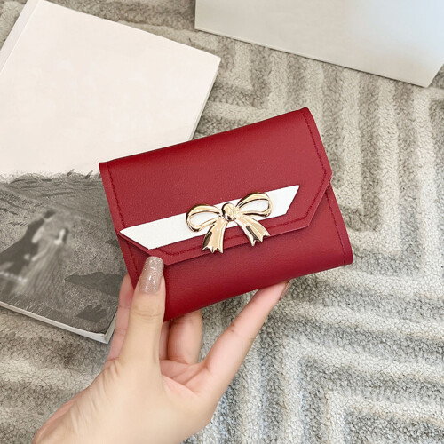 Women's vegan leather RFID-blocking mini bifold wallet 1