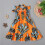 Vestido infantil sem mangas com suspensórios e estampa Ankara. 2
