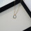 Collier à chaîne dorée avec pendentif carré œil-de-chat 4