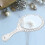 Vintage embossed oval hand mirror silver 2