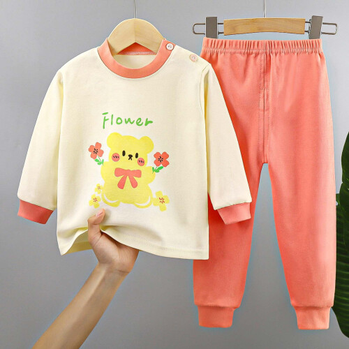 Ensemble pyjama bébé jaune clair, haut à manches longues et élastique 1