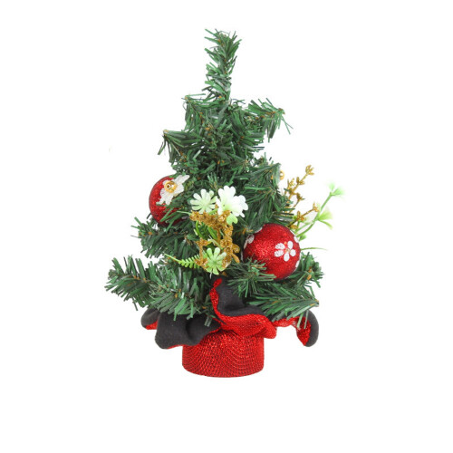 Christmas tree decoration with pine needles and red fruit