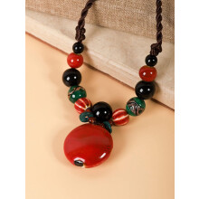 Collana boho con perline di ceramica colorate e spesse