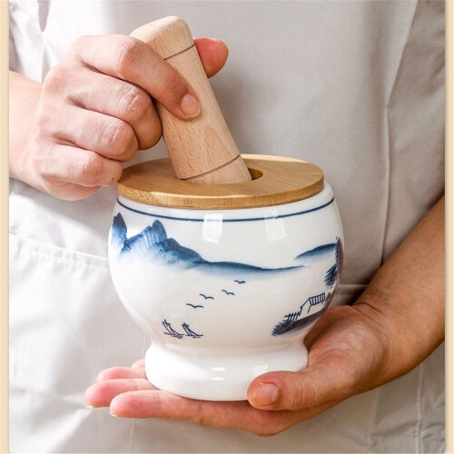 Ceramic garlic pounder with chili pepper design, manual 2