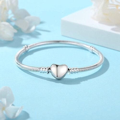 Pulseira feminina com pingente de coração em prata de lei 925 e rosa. 1