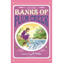 On the Banks of Plum Creek by Laura Ingalls Wilder Paperback Book
