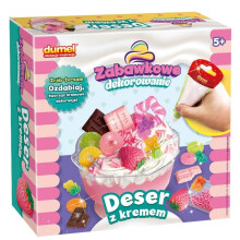 Legetøjsdekoration af dessert med fløde