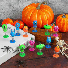 6pcs Monsters Bouncing Toys Lovely Big Eye Dolls Candy Bag Fillers Collectible Novelty Toy Jumping Up Springs Toy-wdd
