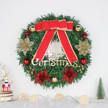 Christmas wreath outdoor red bow with berries and pinecones