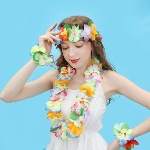Conjunto de tiara havaiana com flores e folhas verdes. 1